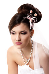 beauty young bride with beautiful makeup and hairstyle in veil o