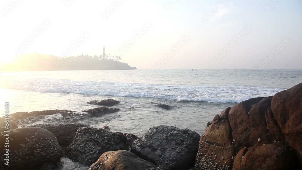 Wall mural Lighthouse and ocean