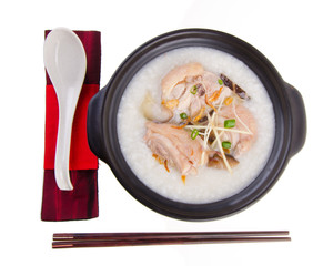 Traditional chinese porridge rice gruel served in claypot