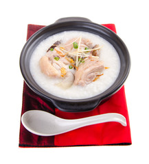 Traditional chinese porridge rice gruel served in claypot