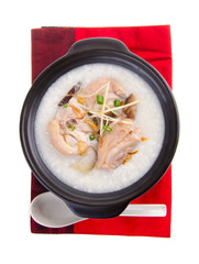 Traditional chinese porridge rice gruel served in claypot