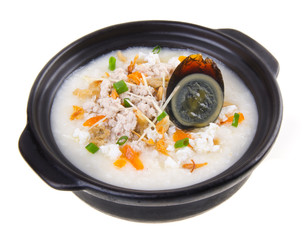 Traditional chinese century egg & pork porridge rice gruel serve