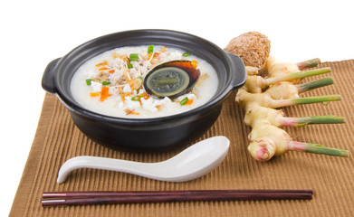 Traditional chinese century egg & pork porridge rice gruel serve