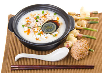 Traditional chinese century egg & pork porridge rice gruel serve