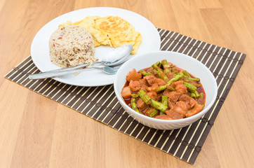 Extremely hot stir fried string bean with pork have rice and ome