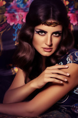 Fototapeta premium Portrait of beautiful young woman with makeup