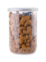 roasted cashew nuts in jar on background