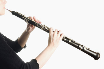 Musical instruments - oboe hands - obrazy, fototapety, plakaty