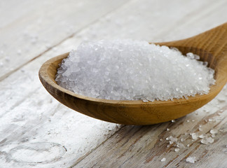 sea salt in  wooden spoon