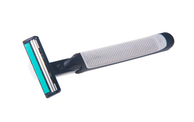 Safety shaver or razor on background