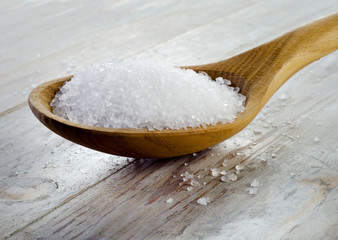 sea salt in  wooden spoon