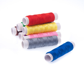 bobbins of thread on background