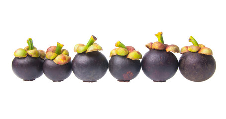Mangosteen fruit and cross section showing the thick purple skin