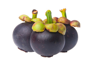 Mangosteen fruit and cross section showing the thick purple skin