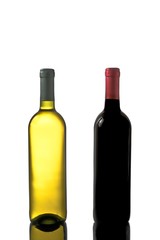red and white wine bottles with reflection