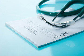 Empty medical prescription with a stethoscope - 56204834
