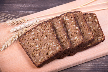 Sliced bread with nuts on a plate