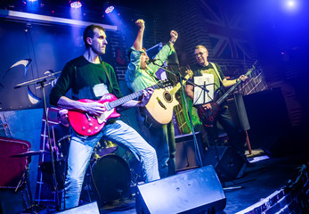 Band performs on stage