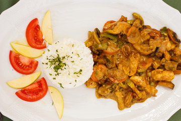 White rice, chicken meat, mushrooms and fresh vegetables