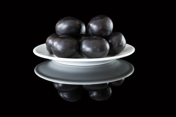 plums on a plate