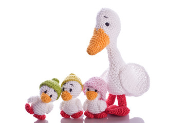 white stuffed animal duck with little chick