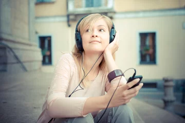 Foto op Plexiglas beautiful blonde woman listening to music © Eugenio Marongiu
