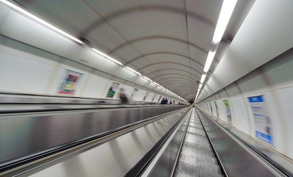 subway escalator with motion blur