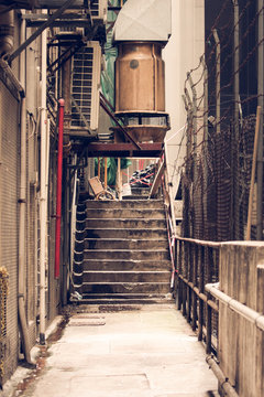 Fototapeta Messy side alley in hong kong