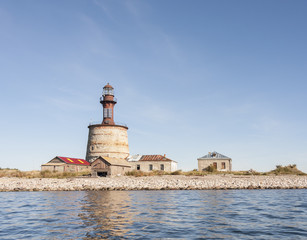 Ancient lighthouse on an island © RistoH