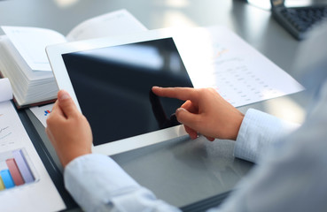 Businessman holding digital tablet