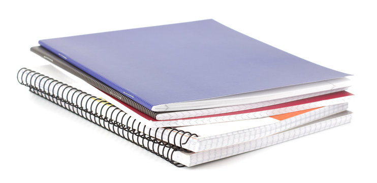 Notebook stack and pencils. Schoolchild and student studies acce