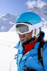Fototapeta na wymiar Skier, skiing, winter sport - portrait of skier
