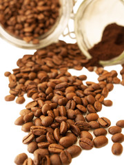 Heap of coffee beans from jar