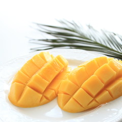 tropical fruit, mango cut on dish for dessert