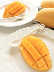 tropical fruit, mango cut on dish for dessert