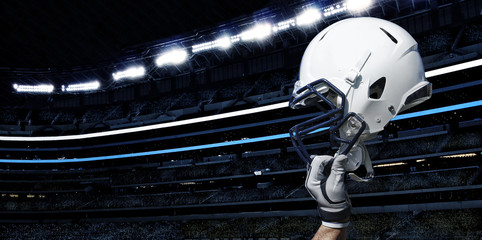 Raised Football Helmet at an American Football Stadium