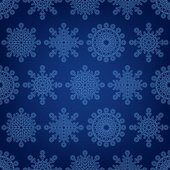 Seamless pattern of snowflakes on a dark background