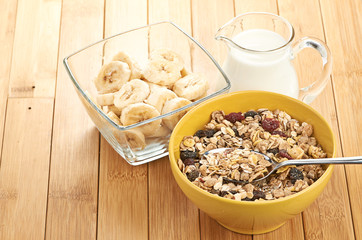 Delicious and healthy cereal in bowl with milk