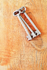 key on wooden background