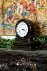 Fototapeta na wymiar clock on the chimney
