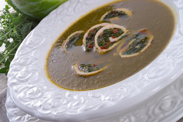 Cabbage soup with meat rolls