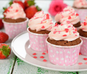 Chocolate cupcakes with pink cream