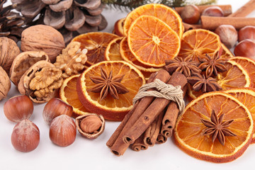 dried orange sliced with cinnamon and nuts
