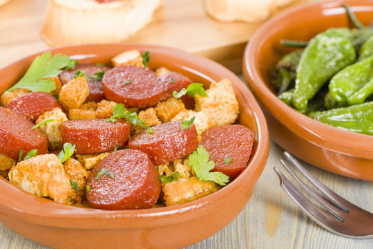 Chorizo & Bread and Padron Peppers Tapas - Spanish tapas dishes.