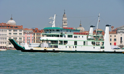 huge ferryboat for the transport of people and cars in the lagoo