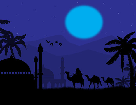 Bedouin camel caravan and mosque