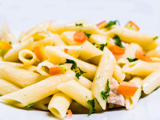 pasta and chicken with lettuce