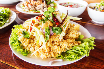 Crispy catfish salad with green mango and vegetable