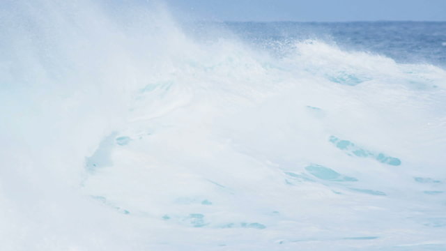 White Topped Giant Surfing Waves Close Up