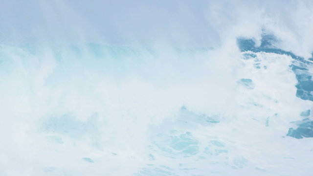 White Topped Giant Surfing Waves Close Up